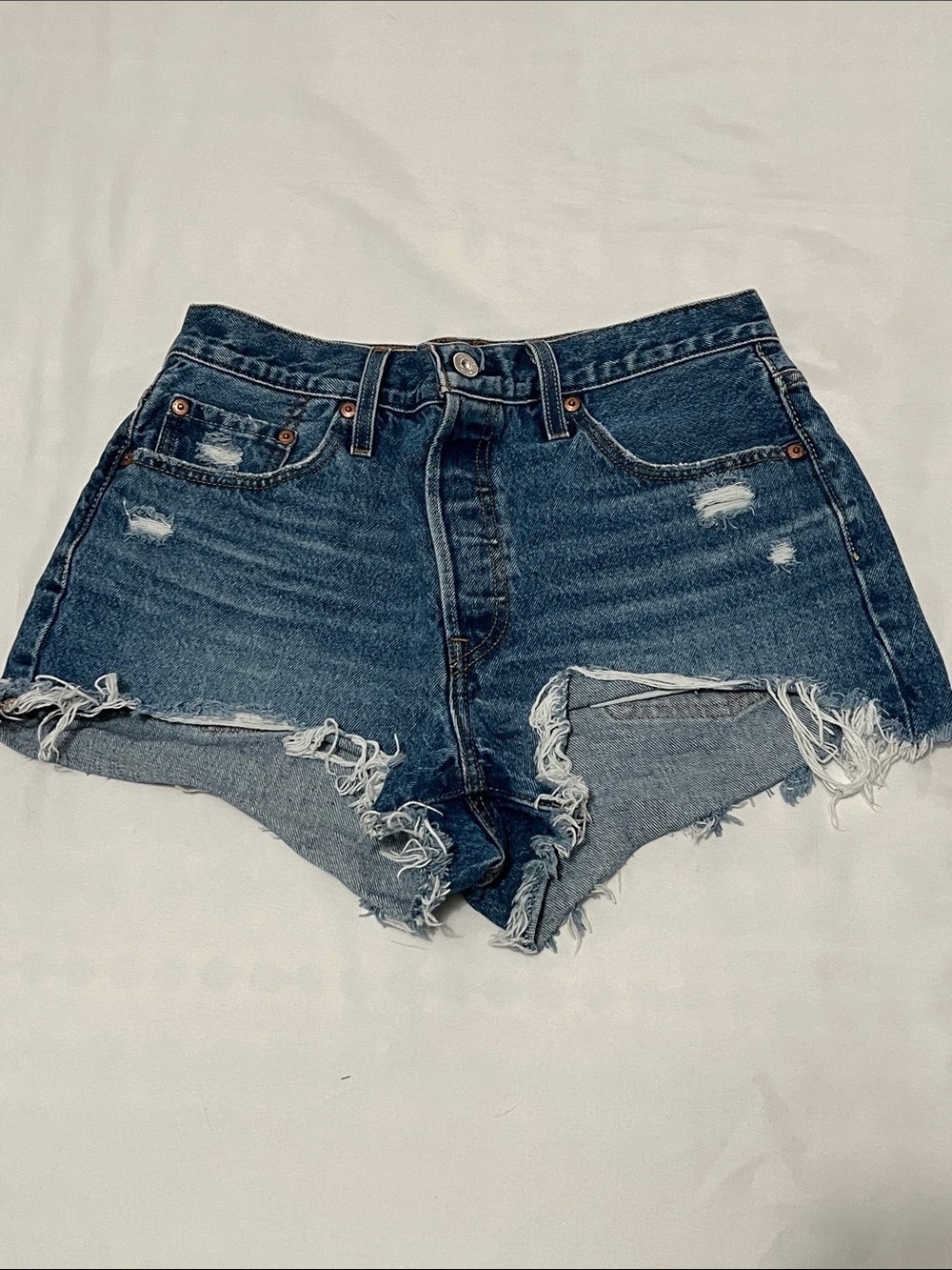 Levi’s 501 Button Fly Distressed Denim Shorts